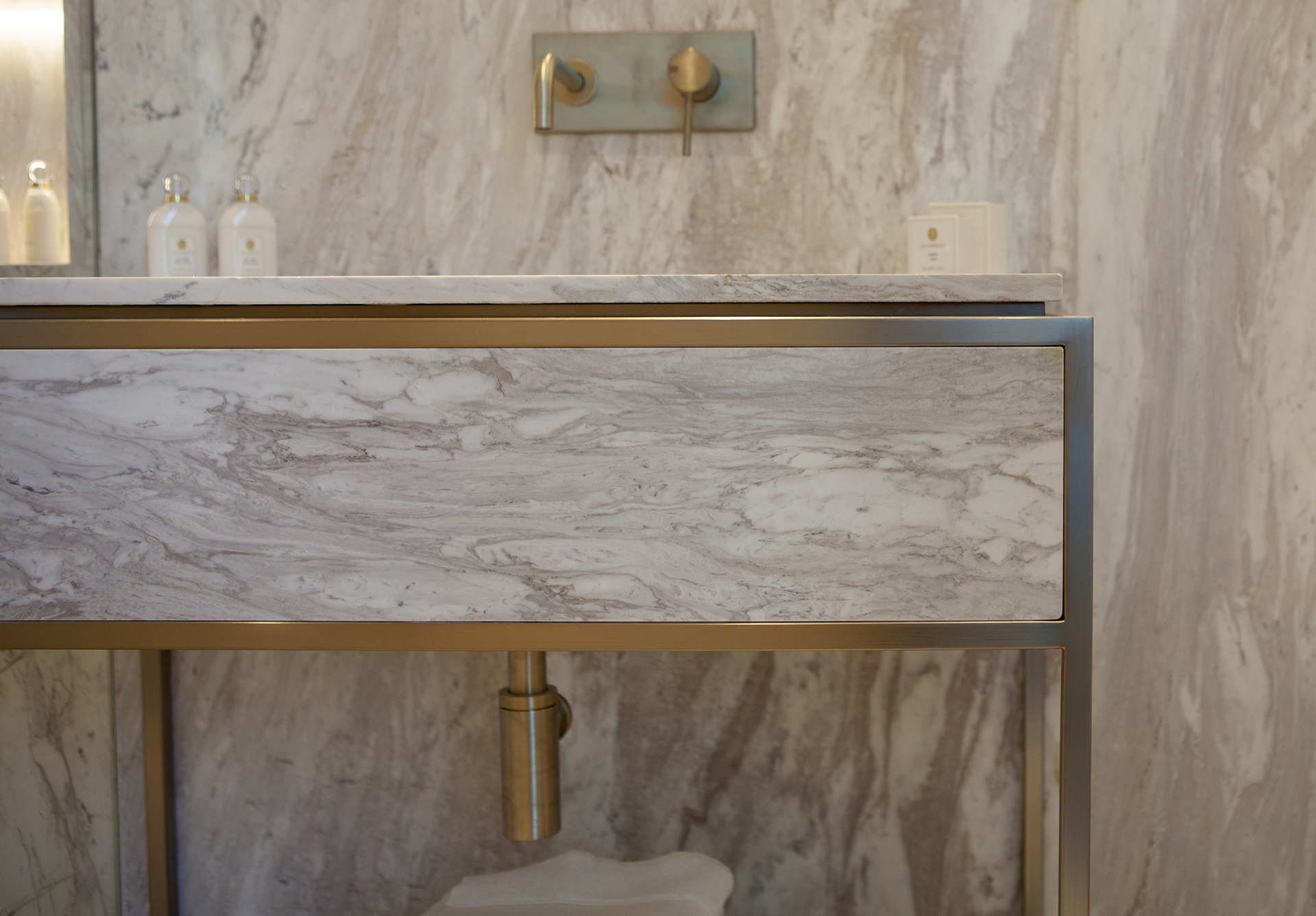 Cherwell Metal Works marble bathroom counter top at Regal London Dubai, Luxury marble and metal work washbasin.